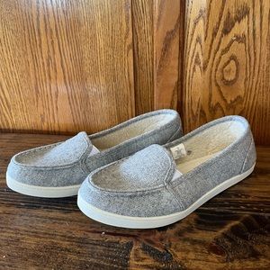 Woman’s flat gray shoes